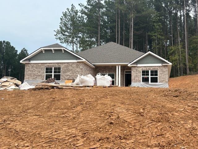 BEAUTIFUL NEW BRICK RANCH WITH 3 CAR SIDE ENTRY GARAGE ON 1 ACRE. Awesome Top Selling 4BR/2BA Ranch Home on a Beautiful Wooded Homesite. Home Features Spacious kitchen with gorgeous granite island, upgraded painted white cabinets & stainless steel appliances. LVP IN MOST ROOMS. Expansive family room. Large Master Suite with tray ceiling, walk-in closet, dual quartz vanity, shower & soaking tub. Two more sizable secondary bedrooms. Includes 4 zone irrigation system. ** Only $1,000 Earnest Money** Located in highly sought after, beautiful Jackson County, GA and convenient to the Pendergrass/Jefferson Exit or Maysville/Commerce Exit on I-85 for quick travel to Atlanta, GA, Lake Hartwell & Greenville, SC, as well as Hwy 129 for easy access to Athens, GA!!! Multi-Award Winning, Family Owned Builder. 1 Yr Builder's Warranty, 2 Yr Systems Warranty, 10 Yr Structural Warranty, 2 Pre-Closing Walk Throughs & a Smart Home Package. Call for builder incentives. Contingency acceptable if other property is listed or under contract. "Don't miss your chance on a beautiful new home in Eagle Heights with a budget Friendly HOA. Eagle Heights is convenient to dining, shopping and easy access to Greenville, SC, Atlanta, Ga, and I-85. Check out our beautiful, decorated model home in Eagle Heights for current design trends. Model Home Sun and Mon 1 pm-6 pm, Tue-Sat 11 am-6 pm. "Renderings and plans are for illustration purposes only and may include additions, options or modifications not part of the standard offering, and are subject to change without notice or obligation".