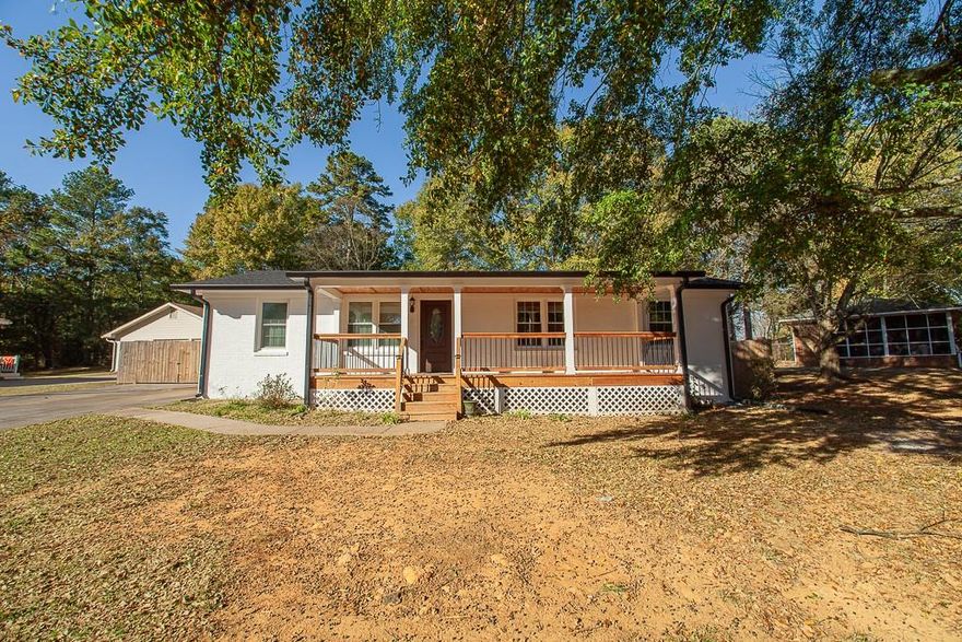 Totally remodeled 3/2 RANCH in Cartersville city school district! Step into calm and clean when you open the door to this beautifully and completely remodeled brick ranch in a quiet and established neighborhood in one of the more sought-after parts of town. Super close to great schools, shopping, and restaurants, with easy access to all the area’s major highways and I75. The home has fresh paint throughout, both inside and outside. New tile floors throughout. The completely remodeled kitchen has new cabinets, new quartz countertops, upgraded lighting, and a sleek stainless-steel stove and hood. Both bathrooms have also been masterfully renovated with new vanities, new countertops, upgraded lighting and plumbing, new toilets, and new tiled walk-in showers with glass doors. Outside, you can sip your coffee or relax with a glass of wine on either of the brand-new covered porches. The front porch has tasteful beadboard ceiling with recessed lighting while the back porch boasts a vaulted beadboard ceiling adding loads of ambiance to an already beautiful home. The back yard also has a newly poured concrete pad and walkway. New HVAC and air ducts, installed one year ago. One year old water heater. New roof and gutters installed 2/2025. Newly installed windows and newly insulated attic. Washer and dryer are both one year old and will remain with home. Two storage sheds also remain with home.