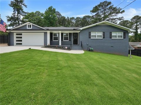 Photo of 5521 Joeclay Drive, Stone Mountain, GA 30088 (MLS # 7625934)