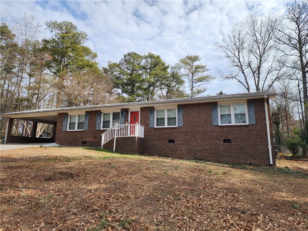 This beautifully maintained ranch-style home in the heart of East Marietta offers both comfort and convenience. This home is move-in ready! The spacious floor plan includes a family room with a brick fireplace and gas logs, a separate dining room, and a white kitchen with tons of cabinets. The dedicated laundry room with built-in cabinets add to the home's functionality. One of the standout features is the huge sunroom, offering additional living space and easy access to spacious private backyard with large storage shed. The large, level, fenced-in backyard is perfect for outdoor activities, pets, and gardening. Located in a super convenient area, this is home you don’t want to miss! Tenant is responsible for all utilities and lawn care. Minimum lease term: 12 months. All occupants 18 years or older must complete an application ($75 fee per adult, paid online via credit card). Multiple applications may be reviewed at once. Housing vouchers are not accepted for this property.