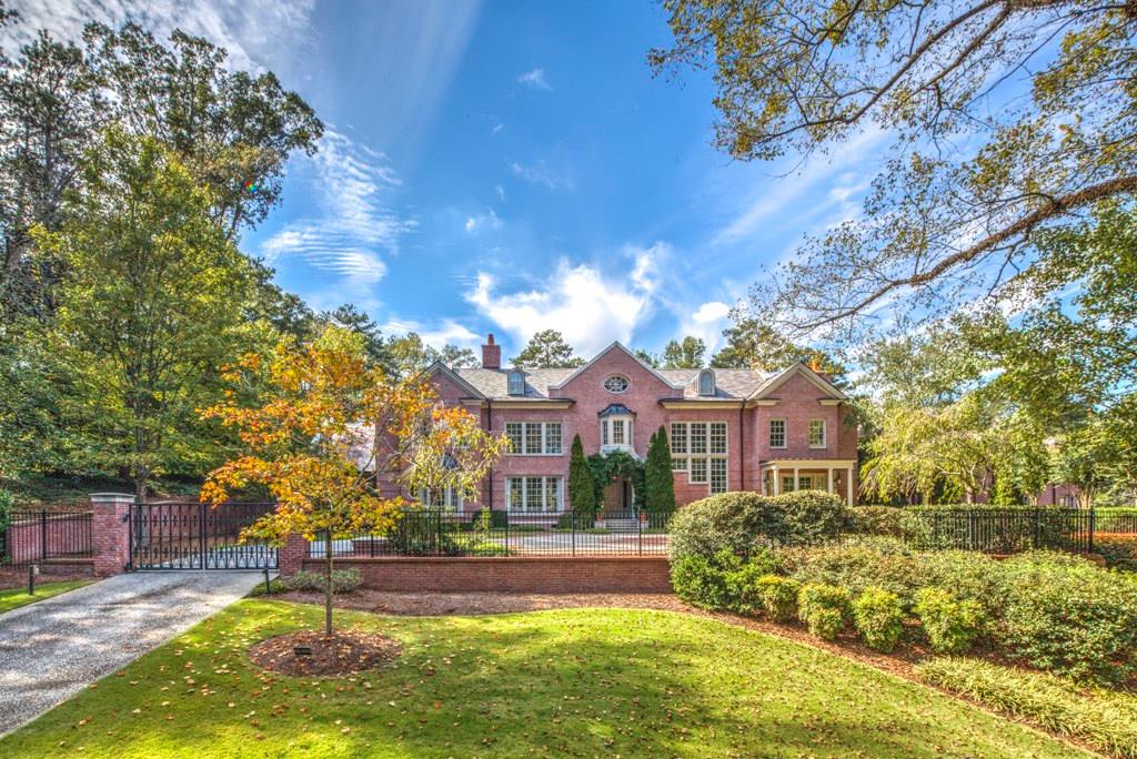 Beautiful gated English estate on 3+acres in prime northwest location. Updated, designer finishes throughout. Light filled foyer & stairhall. Mahogany paneled library. Spacious living, dining & family rooms with masonry fireplaces & French doors opening to outdoors. Gourmet kitchen flows to large famrm & walk-in butler pantry. Lux master suite with limestone bath, lg walk-in closets. Porte cochere & attached carriage house with guest suite. Gorgeous private, walk-out backyard with level lawns, pool & pool cabana with fplc, kitchenette & half bath. Exercise rm. Generator