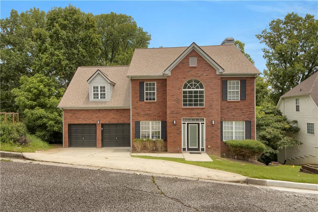 Nestled in the prestigious Inverness Ridge Subdivision of Cobb County, this charming residence offers the perfect blend of comfort and sophistication across three levels. Welcome home to this spacious two-story brick-front gem, boasting a full basement for added space for extra storage. Step inside to discover an inviting main level adorned with gleaming hardwood floors throughout main level and plush carpeting upstairs bedrooms. The heart of the home lies in the gourmet kitchen, complete with stainless steel appliances, abundant cabinetry, and a convenient breakfast bar overlooking the cozy family room, where gatherings are made memorable by the crackling fireplace. Entertain al fresco on the expansive patio deck which is scheduled to be pressured washed and possible re-staining, perfect for summer barbecues and outdoor dining. Retreat indoors for formal gatherings in the elegant dining room, or find peace and serenity in the separate living room. Upstairs, the spacious owner's suite awaits, featuring a spacious walk-in closet and a spa-like master bathroom with a soaking tub, separate shower, and dual vanities. Additional bedrooms provide comfort and convenience for family and guests alike. With a two-car garage and upper-level laundry room included, this home offers both practicality and opulence. Experience the best of suburban living with easy access to top-rated schools, private schools (Whitefield Academy), close proximity to interstate, shopping, dining, and recreational amenities. Don't miss your opportunity to call this Inverness Ridge beauty home.