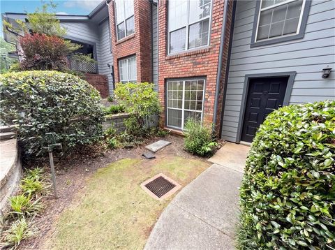 Photo of 1128 Weatherstone Drive NE, Atlanta, GA 30324 (MLS # 7765317)