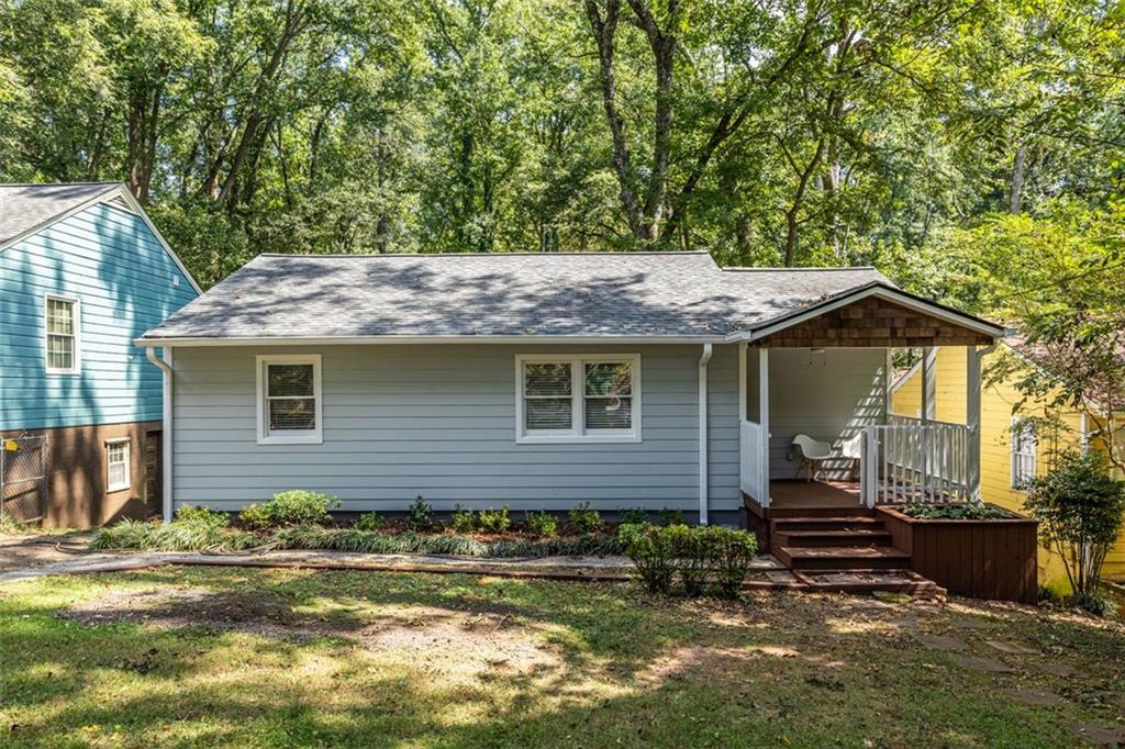 Location, Location, Location!
This 3/2 charming bungalow is nestled on a quiet, dead-end street that backs up to the Kirkwood Urban Forest. It’s rare to find this kind of privacy and tranquility just steps from the action, but here you get both.
Enjoy morning coffee on the quaint front porch, entertain on the spacious back deck, or unwind in the large, private backyard with direct access to the Urban Forest – perfect for nature lovers and those seeking a peaceful retreat.
Inside, this home boasts classic bungalow charm, featuring arched doorways, hardwood floors throughout, and an abundance of natural light.
With a finished basement suite complete with a bedroom and full bath, it's ideal for guests, a home office, or rental potential.
You’re perfectly positioned with a 10-minute walk in either direction to some of Atlanta’s most vibrant neighborhoods. Head to favorites at 2nd and Hosea like Perc Coffee, La Fonda, Poor Hendrix, Gene’s, and Mix’D Up Burger or head to downtown Kirkwood, home to Taproom Coffee, Evergreen Bakery, The Argonaut, Urban Pie, Soberish, and more!
The tight-knit Kirkwood community hosts year-round events, giving the neighborhood a true small-town feel in the heart of the city.
This one truly checks all the boxes – location, community, and lifestyle. Don't miss out on this opportunity!