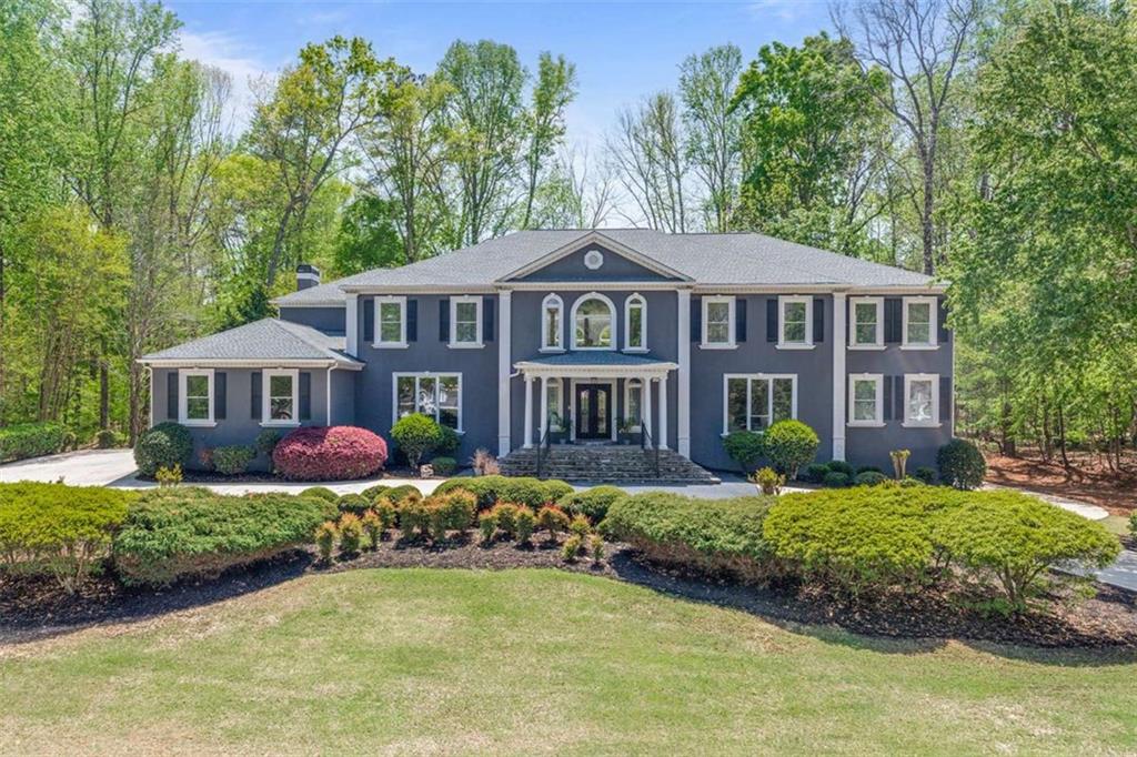 Discover unmatched elegance and sophistication in this stunning estate, nestled within the prestigious gated Whitewater Creek community in Fayetteville, GA. Situated on a beautifully landscaped **1.3-acre lot**, this residence features **7 bedrooms, 7.5 bathrooms**, and every amenity designed for a life of comfort, style, and entertainment. The chef's kitchen is a true masterpiece-custom range hood, built-in wine cooler, professional-grade appliances, three ovens, and a grand island perfect for hosting and gathering. Retreat to the primary suite, a private sanctuary of over 1,500 sq. ft., offering a spa-inspired shower, jacuzzi tub, and dual custom walk-in closets wrapped in marble elegance. Each of the secondary suites is thoughtfully designed with en-suite bathrooms and distinctive custom tile. The fully finished terrace level offers the ultimate entertainment space-complete with a **10-seat theater, home gym, billiards room, custom bar, and second laundry room.** Step outside your door into a community tailored for leisure and recreation. Whitewater Creek offers: Championship 18-hole golf course, Resort-style pool & sundeck, Tennis & pickleball courts, Playground & fitness center, Clubhouse with event space, and Full-time security for peace of mind. This property represents more than just a home-it's a lifestyle. With expansive indoor and outdoor living, world-class community amenities, and timeless luxury at every turn. Don't miss the chance to experience it for yourself-schedule your private showing today.