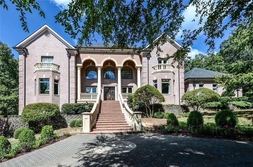 Resort living across from River on 3+ acres. Majestic brick, 2 story entry w/marble flrs, dual stairs. Cherry hardwd flrs & custom millwork thruout. Study w/coffered ceiling, huge dining rm, Butler's pantry, wine fridge, warming drawer. Living rm w/limestone mantle. Chef's kit w/keeping rm, custm cabinets, side/side Subzero refrigerators, Dacor cooktop, double ovens. Huge master ste, bath w/slate counters & Jacuzzi tub for 2. Terrace level w/media & exercise rm. Attached 2 bed/2 1/2 separate garage & entrance. Saltwater pool & hot tub