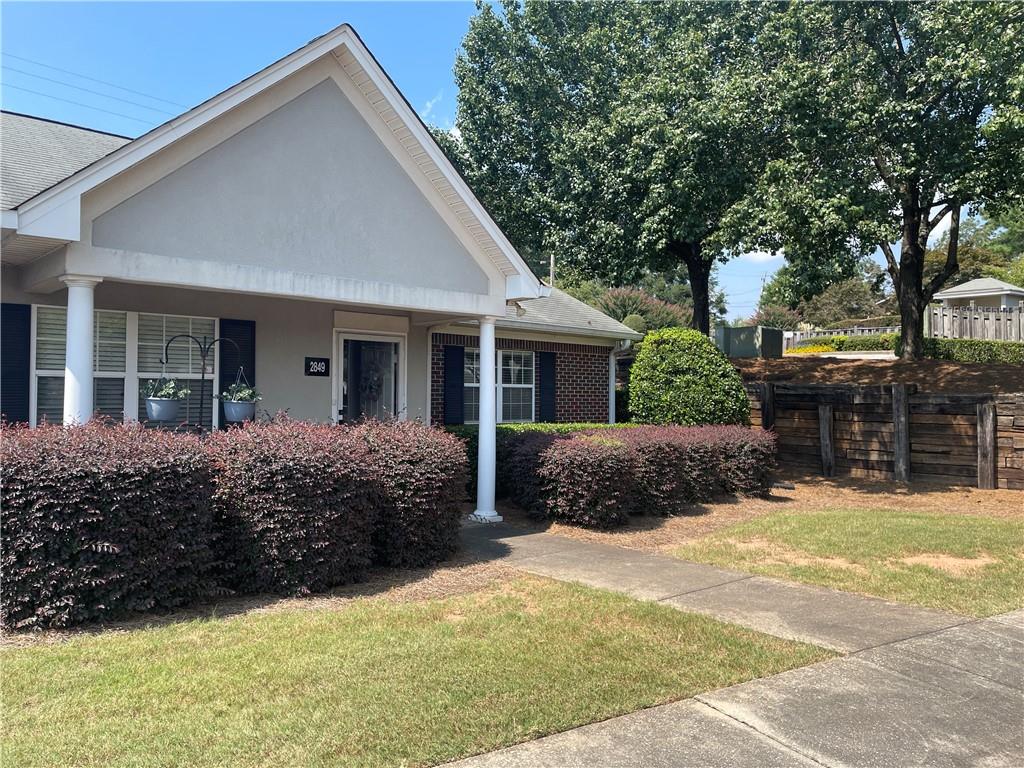 Cute 2 Bed 2 Bath Condo in a quiet part of Gainesville. Ready to move in with an updated kitchen that features quartz countertops and subway tile backsplash. Quiet neighborhood with rental restrictions allows you to enjoy your space with other owners in the neighborhood. Can be a perfect investment for a first time home buyer looking for apartment comforts of very little maintenance but benefits of building equity owning their own home. Each bedroom offers its own bathroom, perfect for roommate plan. Enclosed back porch allows for year round usage of the extra space. HOA Fee covers Swimming Pool, Clubhouse, Outside Maintenance including Lawn/Pest Control, Water and Trash.