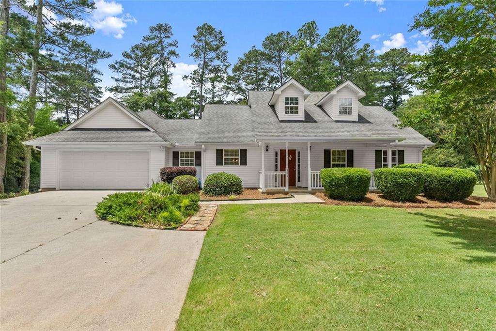 This beautifully updated ranch-style home offers easy one-level living with a thoughtful split-bedroom floor plan—giving the master suite added privacy on its own side of the house. Step inside to brand-new LVP flooring, remodeled kitchen and bathrooms featuring granite countertops, granite backsplash, and new stainless steel appliances. Fireplace has new firebox and chimney. The home is filled with natural light and has a warm, welcoming feel throughout. Outside, enjoy a large, level lot with a fenced backyard—perfect for pets, play, or gardening—and an expansive covered back porch that spans the length of the home perfect for summer nights. NO HOA! Move-in ready and full of charm, this one is ready for your personal touch! LOCATION LOCATION LOCATION! Right across the street from Victor Lord Park & dog park and just 4 minutes to DT Winder and 4 minutes to Ft Yargo State Park offering a 260 acre lake and 20.5 miles of trails. THIS HOME COMES WITH A LENDER PAID ONE-YEAR RATE BUYDOWN IF preferred lender is used. Jacob Dukes, Fairway Independent Mortgage.