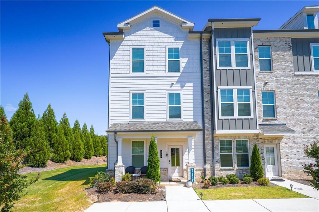 2022 built beautiful END UNIT townhome for SALE in a great community in a high-rated school district in Fayetteville GA! 4 Beds / 3.5 Baths / 2 Car Rear Entry Garage. Split bedroom plan. Bonus/Game Room. Owner's Suite has double Vanity Sinks, separate Shower, Walk-in Closet. Open Plan from Family Room to Gourmet Kitchen. Stainless Steel Appliances: Cooktop, Microwave, Wall Oven, Garbage Disposal, Dishwasher and Refrigerator. LVP Flooring throughout Living areas and Carpet in Bedrooms. Blinds and Window Screens. Quartz Countertops w/ Tile Backsplash. Smart Home enabled. NO RENTAL RESTRICTIONS! Great Opportunity for Investors! Within minutes from Trilith Studios of Y'allywood, hub of movie making!