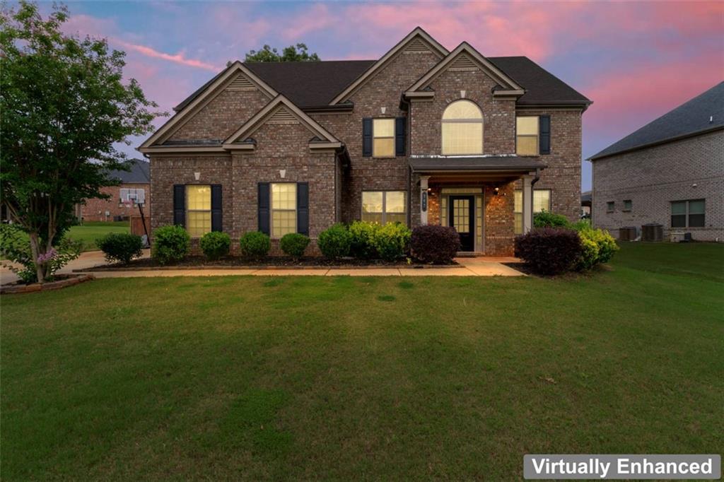 Welcome Home! This 7-bedroom, 5-bath all-brick three-story home offers the perfect blend of space, style, and comfort in a vibrant swim and lake community just minutes from local shopping, dining, and local private and public schools. Step inside to find a beautifully open-concept kitchen that flows seamlessly into the breakfast area and the cozy family room, complete with a warm fireplace-ideal for everyday living and entertaining. The main level also features a formal dining room, living room/study, a guest bedroom, a full bath, and a convenient laundry room. Upstairs, the second level showcases spacious secondary bedrooms and an impressive owner's suite, featuring a private sitting area, luxurious owner's bath, and two walk-in closets designed for ultimate convenience. The third level offers even more flexibility with two additional bedrooms (each with walk-in closets), a full bath, and a generously sized game/media room-perfect for movie nights, a playroom, or multi-generational living. Enjoy the best of community living with access to the lake, pool, and family-friendly amenities. Thim is more than just a home-it's a lifestyle. Don't miss your chance to own this exceptional home in a highly desirable location. Schedule your private tour today!