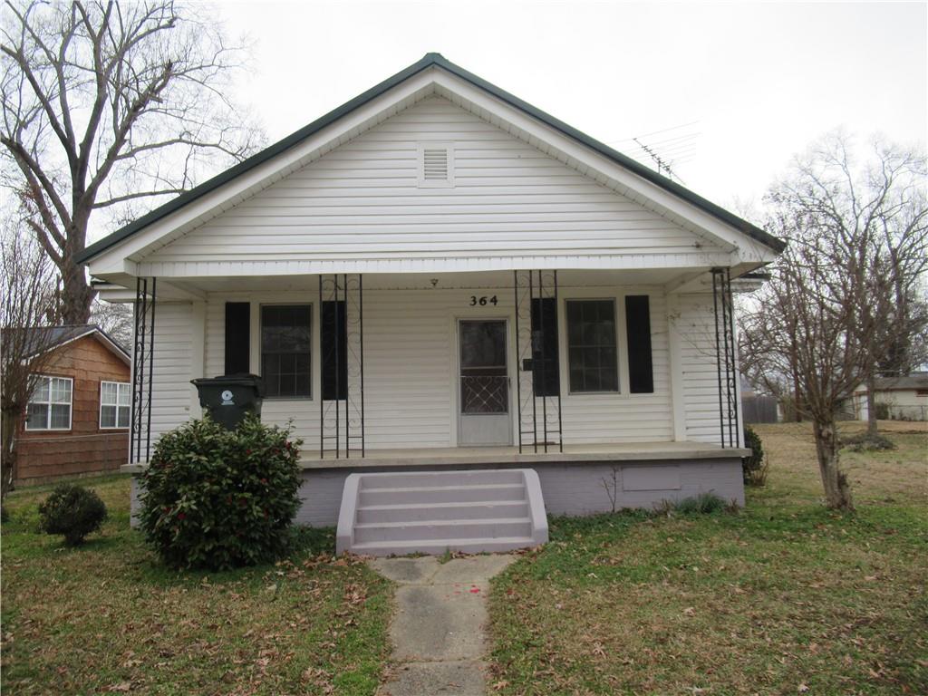 Investor Special! Tenant occupied- please do not disturb! This 2 bedroom, 1 bath house is full of charm. Large city lot with outbuilding to boot. Vinyl siding and metal roof make for easy maintenance! Back on market at no fault of seller.