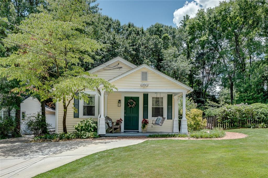 Embrace in-town living in this lush & conveniently located Underwood Hills neighborhood. Just a block from the neighborhood park w/playground, basketball & tennis courts. This 3BR/2BA is turnkey w/flexible spaces for a home office, play room, home gym, etc. Fresh paint throughout, bright, white kitchen & open floor plan. Oversized yard is perfect for entertaining w/deck, patio & raised gardening beds. Huge back yard is level & private - shed provides extra storage. Move-in ready w/a host of opportunities for expansion if desired. Convenient to the Westside, Buckhead & Midtown plus all Pro Sports Arenas, highways, the airport & more. What's not to love?