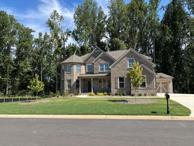 Discover this BRAND NEW 5 Bed/4 Bath, 3 Car garage on an unfinished basement nestled in the gated community of Sierra Lake. This home has upgrades galore and is absolutely gorgeous! It has a gourmet kitchen with views to the family room and easy access to the formal dining room that creates a seamless and enjoyable environment for hosting and gatherings. Step outside to the covered back patio to enjoy a tranquil view of the private backyard surrounded by beautiful, mature trees. Every detail has been carefully considered. It has one large bedroom on the main level with private access to a full bathroom. The main level also has a flex room that can be used as an office. Sierra Lake has resort style amenities including a pool, clubhouse, fishing lake with dock, playground and scenic walking trails. Conveniently located near Lake Lanier and GA-400. We require that we pull credit and background checks. Credit must be 650+. We allow 2 pets max. Weight and breed must be approved by our office. It will increase your monthly rent by $50 per pet plus a pet deposit of $2400 will be due upfront.