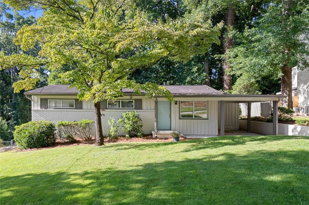 This stunning 3 bedroom, 2 bathroom home has been thoughtfully updated with designer finishes and modern touches throughout. Step inside to find fresh interior and exterior paint, soaring vaulted ceilings, and a fully renovated kitchen perfect for entertaining. A recently added second full bathroom. You’ll love the upgraded lighting, landscaping, and cozy design choices that give the entire home a warm, elevated feel. Out back, enjoy a private, fenced backyard oasis complete with a spacious deck, built-in fire pit, and grilling area. Located just minutes from the exciting new Lulah Hills development and convenient to I-285, Toco Hills, historic Downtown Decatur, dining, shopping, and more. This home truly has it all!