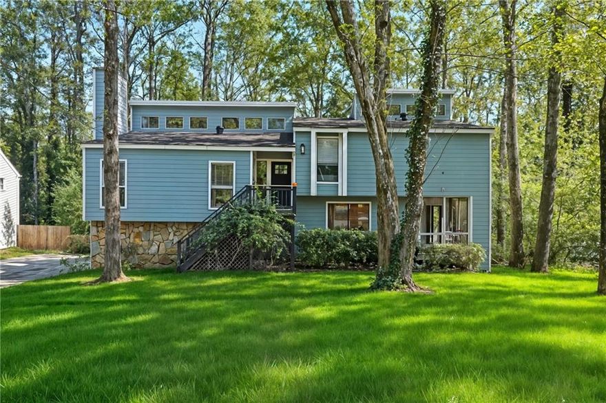Located in the desirable Pope High School district, you will find this updated and well maintained, 3 bed/2 bath home with a large basement. True pride of ownership as the seller has completely replaced all of the cedar siding with wonderful hardie-plank. Inside, you will find high ceilings, lvp flooring throughout the dining and living areas and all of the bedrooms. The charming cottage kitchen features refinished wood cabinets, bead board wainscoting, a 5 burner SS gas range, high ceilings, and lvp flooring. The master has an updated bathroom and beautiful stained-glass windows with soring ceilings. The two additional bedrooms upstairs share a bathroom with plenty of countertop space. All of the interior doors, including the front door, have been replaced. The water heater was replaced last year as well. 

  -----The large, open terrace level contains an office and is recently primed neutral, so you can paint it whatever color you would like. Two back decks (one is brand new) with built in seating and ample room for grilling or relaxing. The backyard has a firepit, perfect for fall weather, and is wooded and private.  There is a great spot for basketball in the driveway, and the house sits at a cul-de-sac for extra parking. The neighborhood is transitioning and has a lot of upscale renovations going on throughout. Excellent location close to shopping, great schools, and many dining options. 15 min to DT Marietta or to DT Roswell, where some of the best night life and restaurants are located.