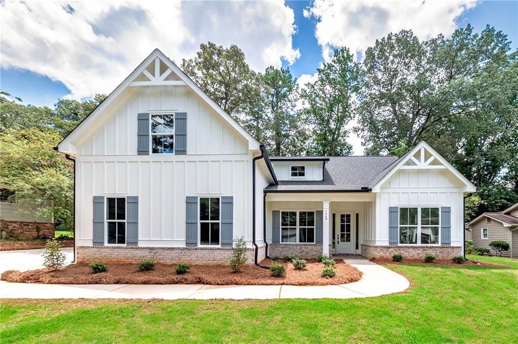 $5,000 incentive with preferred lender! Stunning brand new ranch-style home perfectly positioned in the heart of Sugar Hill, nestled within a beautiful and established neighborhood. Thoughtfully designed for modern living, this spacious 4-bedroom, 3-bath home effortlessly blends luxury, comfort, and convenience. From the moment you enter, you’ll notice the high-end finishes, including durable and stylish LVP flooring that runs throughout the home. The open floor plan flows seamlessly from the elegant foyer into a light-filled family room featuring a cozy gas fireplace — the perfect place to unwind or entertain guests.
The chef’s kitchen is a true centerpiece, boasting custom high-end cabinetry, gleaming quartz countertops, and ample workspace for any culinary endeavor. A separate formal dining room offers an ideal setting for hosting dinners and holiday gatherings. Just off the garage, a custom-built mud bench adds both charm and functionality for everyday convenience.
The home’s layout includes three bedrooms on the main level, including a luxurious master suite with generous proportions and a spa-like en suite bath. Upstairs, a private fourth bedroom and full bath create the perfect retreat for guests, teens, or a quiet home office. Step outside to enjoy a covered rear patio overlooking a peaceful and private backyard — a serene space to relax or entertain year-round.
Located just moments from Sugar Hill’s vibrant downtown, parks, shops, and dining, this home offers the best of both privacy and proximity. Don’t miss your chance to own this rare new-construction gem in one of the area’s most charming communities.