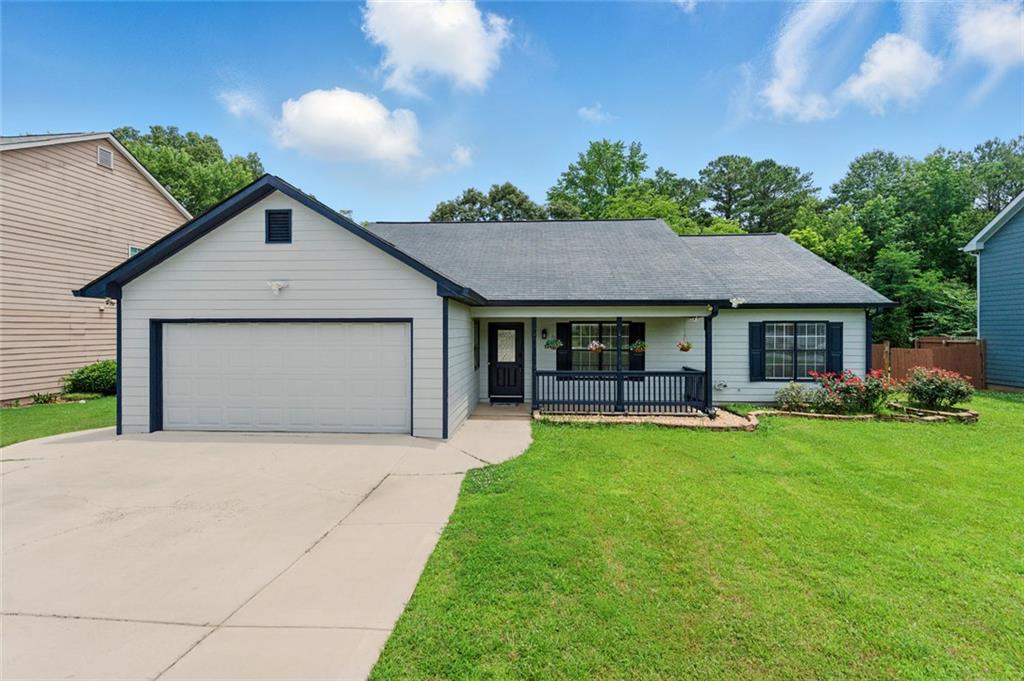 Welcome to this Charming Ranch Home Just Minutes from Downtown Lawrenceville - beautifully updated ranch-style home nestled in a quiet, no-HOA neighborhood! This home truly has it all — including a spacious fenced backyard with a small pool, perfect for relaxing or entertaining! Step inside and be greeted by an abundance of natural light, fresh paint throughout, and a warm, inviting layout. The chef’s kitchen features stained cabinetry and a cozy breakfast area. A separate in-law suite complete with its own kitchenette and dining space - perfect for guests, extended family, or more! This flexible layout offers endless possibilities — perfect for a single-family residence or a multi-generational household. Whether you're looking to live in the main home and use the in-law suite for guests or generate additional rental income, this property has you covered. Located just minutes from Downtown Lawrenceville, Rhodes Jordan Park, University Parkway, shopping, dining, and entertainment, you'll enjoy both comfort and convenience in one great package. Homes like this don’t last long — schedule your showing today!