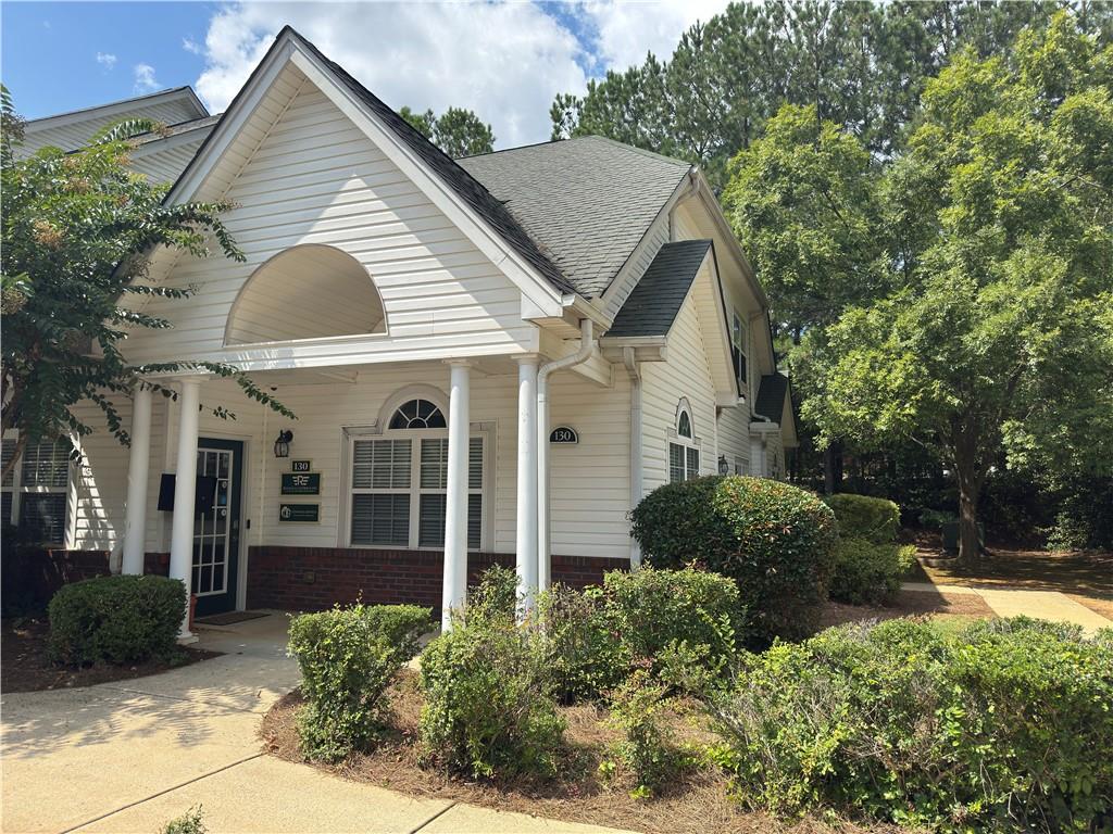 An Exceptional Opportunity for Growth in Cobb County. Built in 2000, and conveniently located on Piedmont Road in East Cobb, this updated office condo is ideally situated in a quiet professional office park. There is a new high efficiency HVAC system installed in 2021 along with upgraded interior finishes and fresh paint. There is an abundance of natural light throughout. A welcoming reception area immediately sets the tone, and French Doors open into a spacious and light-filled conference room, complete with built-in shelves. There are four offices on the first floor that are big enough for co-working shared space. You’ll find an executive office and expansive co-working areas on the second floor with lots of natural light. This level also includes a second bathroom, uniquely equipped with a built-in shower. There is attic access for additional storage too. This is more than just an office; it's an opportunity to build equity in an asset and say goodbye to rent and unpredictable increases. The office park provides plenty of parking for both employees and clients. Furthermore, the low taxes contribute to a lower overall cost of ownership.