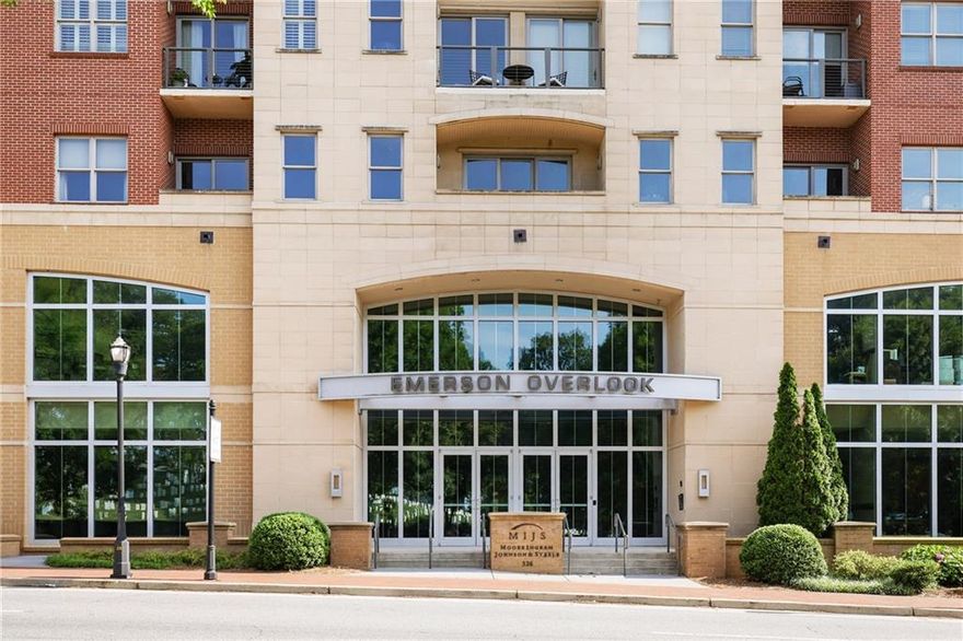 Welcome to 326 Roswell Street, Unit 508, in the sought-after Emerson Overlook condo building, just minutes from the vibrant Marietta Square. This beautifully designed one-bedroom, one-and-a-half-bathroom residence offers true stepless living with an open floor plan, hardwood floors, and crown molding throughout. The gourmet kitchen boasts granite countertops, stained cabinetry, bar seating, a gas cooktop, and stainless steel appliances, seamlessly flowing into the spacious living and dining area with private covered balcony. The large bedroom features an en-suite bath with a separate tub and shower, walk-in closet, and direct access to a private laundry room. A stylish half bathroom provides added convenience for guests. The unit also includes two deeded covered parking spaces. Community amenities include a fully equipped gym with sauna, a green courtyard with a dog run, picnic area, and grill. Enjoy low-maintenance living close to Marietta Square’s shops, restaurants, and theaters, as well as Kennesaw Mountain, Kennestone Hospital, and the I-75 Peach Pass lane.
