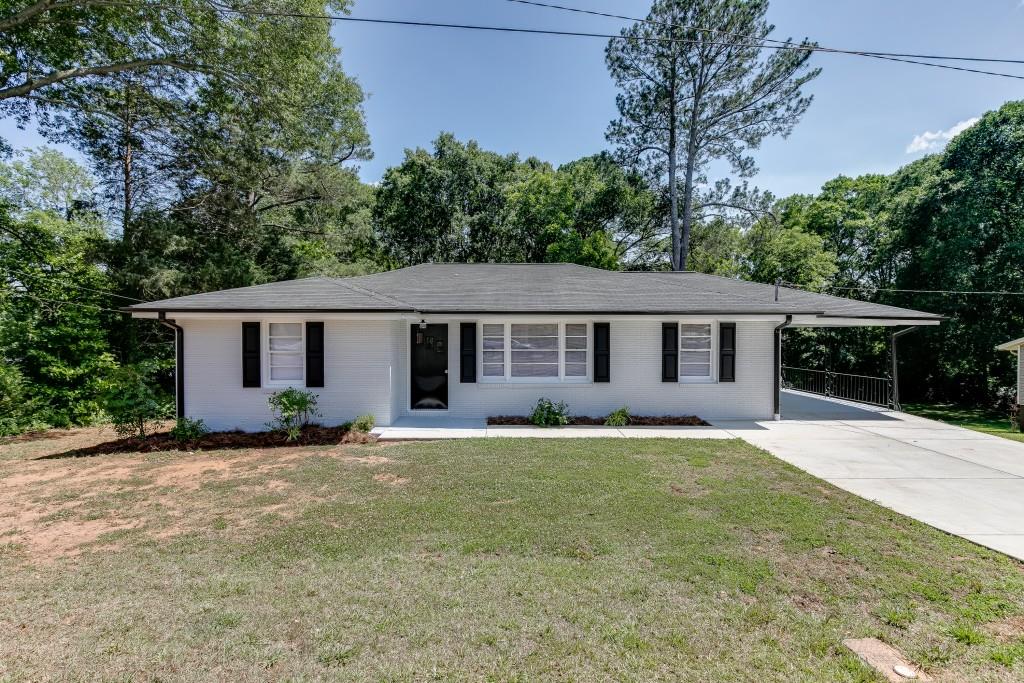 Don't miss this terrific opportunity for a renovated brick ranch close to downtown Jefferson. Spacious kitchen w/ plenty of stained cabinetry, granite counter-tops, undermount sink, tiled backsplash, laminate flooring, new stove, and refrigerator is included. Family room w/ ceiling fan. Separate dining room. Spacious master bedroom w/ dual ceiling fans and large closet. Updated bath w/ new vanity and fixtures, tub/shower unit and laminate flooring. Full unfinished daylight basement has laundry with washer and dryer included and tons of great storage and or potential for finishing. The freshly painted deck overlooks the .46-acre lot. Recent improvements include newly re-finished hardwood floor in the family, dining, and all bedrooms, freshly painted exterior and interior, new stove, newer double car width driveway and an updated roof approx. 5 y/o. This one is clean, ready to move in and enjoy. It won't last long!