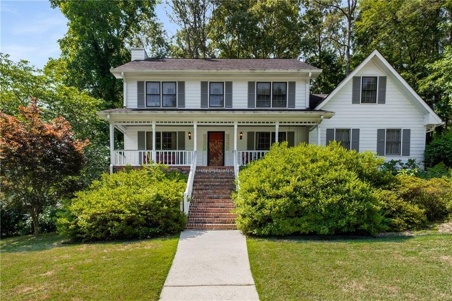 Tucked into the friendly Skyland Glen neighborhood of Snellville, this spacious 4-bedroom, 2.5-bath home with bonus rooms and flex spaces is move-in ready and full of potential. With timeless curb appeal and an inviting rocking chair front porch, it’s a home that’s been lovingly maintained by its original owner—and is ready to shine even brighter with your personal updates.
Step inside to find a generous living room centered around a cozy brick fireplace, a formal dining room perfect for hosting, and a large, central kitchen that truly is the heart of the home. You’ll love the abundance of cabinetry, center island, built-in desk area, walk-in pantry, and bay window breakfast nook. Two staircases offer practical flow between levels, making daily life and entertaining a breeze.
Upstairs, the primary suite features a walk-in closet, spacious vanity, and a large walk-in shower. Three additional bedrooms provide ample space for guests, a home office, or playroom.
The lower level adds even more flexibility, with two finished rooms ideal for hobbies, a media room, or extra living space, plus a workshop and plentiful storage options. Outdoors, the back deck shines — with a screened-in section for relaxing and a sunny open-air area perfect for grilling. The private backyard is shaded by mature trees, and a shed below the deck offers extra space for lawn tools or gear.
With a 2-car side-entry garage, solid systems, and great bones, this home is a perfect blend of move-in ready comfort and long-term potential. Update at your own pace and create your dream space in an established, well-loved community. Some photos have been virtually staged.