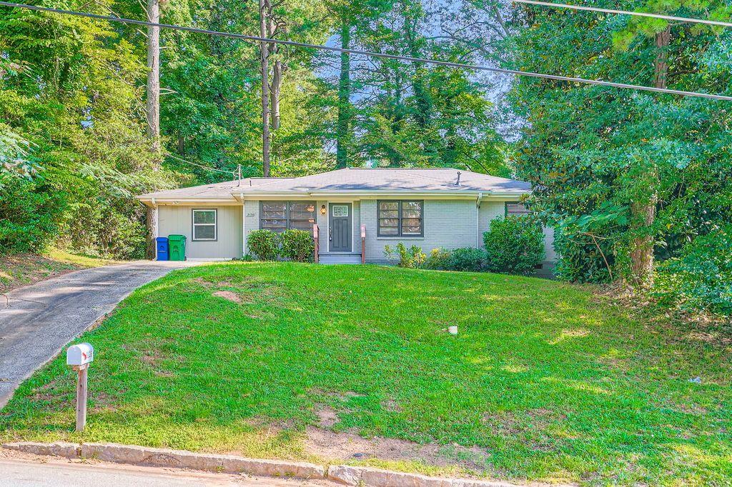 Come home to this 4-bed/2-bath single-family ranch-style home in cozy Belvedere Gardens, located just next to Memorial Dr and close to I-285. This ideal location is close to everything but still enjoys its comfortable suburban nature. The interior features an open floor plan. The kitchen comes equipped with stainless steel appliances such as a refrigerator, electric stove, microwave and dishwasher, complemented by granite countertops, white cabinets, a kitchen island that can serve as a small breakfast bar, and a good view of the family room. The master bedroom has an ensuite bathroom and walk-in closet. The laundry room has a washer/dryer available for tenant use but is not covered by the lease. Polished hardwood flooring covers the hallways, family room and dining area, while warm carpeting is installed in the bedrooms and tiles cover the kitchen and bathrooms. There is a deck overlooking the backyard that is great for sitting and relaxing, and a driveway in the front for parking. There is both an ALDI and Kroger just 3 minutes along Memorial Dr, together with Belvedere Plaza and Walmart offering various shopping and dining options together with other commercial services. Fast food chains and restaurants such as Checkers, Popeyes, and Waffle House can be found in that area as well. You can also drive 3 minutes to International Roti House, just along Covington Highway. Considered to be one of best places in Georgia for Roti, the wait for their roti skins is worth it, and their selection of authentic Caribbean cuisine will satisfy your flavor cravings. Also nearby is One Touch Taste Chicago Style, for authentic and delicious Chicago hotdogs, chili cheese fries, and their Tilapia and Catfish fillets. For recreation, you are just 1 minute away from Midway Park, which offers a baseball field and tennis court, a recreation center and a swimming pool. You can also drive 6 minutes to East Lake Park and East Lake Gold Club, which offers an expansive course for you to improve your handicap. THE MINIMUM LEASE TERM IS 12 MONTHS.