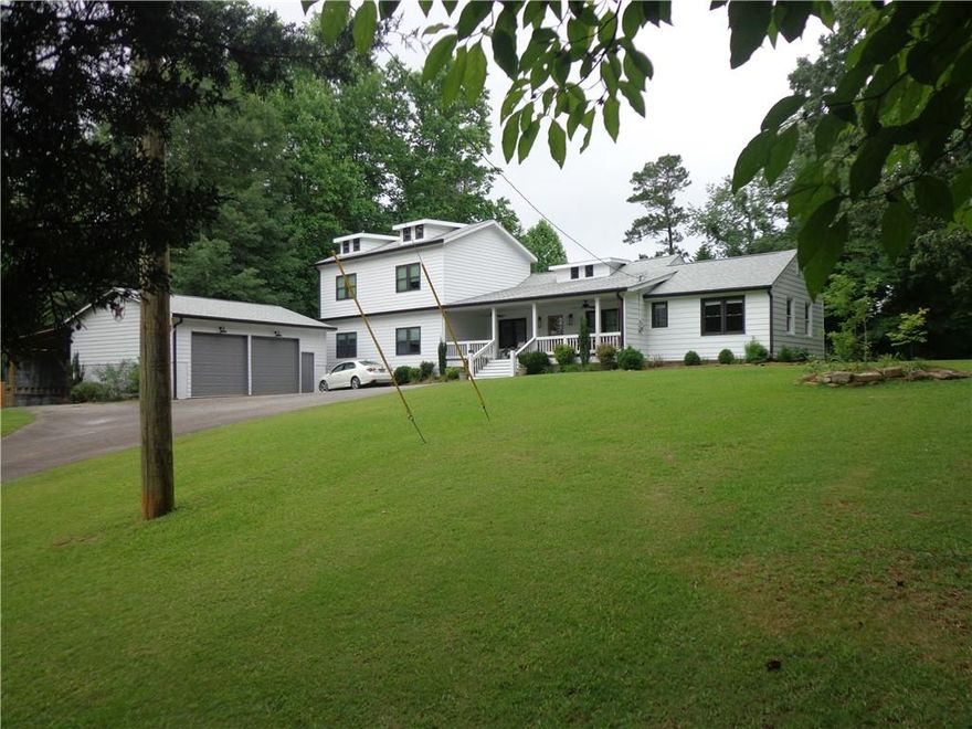 || FULLY RENOVATED || || ALL MAJOR SYSTEMS LESS THAN 7 YEARS OLD IN THE MAIN HOUSE AND A YEAR OLD IN THE NEW ADDITION || ||1400 SQ FT NEW ADDITION || || NEW ROOF || || NEW WINDOWS || || NEW HARDI SIDING ||
|| NEW HARDWOODS + NEW BEDROOM CARPET || || NEWLY CONNECTED PUBLIC WATER + FUNCTIONAL WELL || || 1.21 PRIVATE, FENCED ACRES || || NO HOA + NO RENTAL RESTRICTIONS ||


** What You’ll See **
Drive down your 800-foot asphalt driveway and arrive at a beautifully updated home nestled on a LEVEL, LANDSCAPED 1.21 ACRE LOT. The entire property is FULLY FENCED, giving you peace of mind and privacy. Step onto the CHARMING FRONT PORCH or relax on the BACK DECK, both perfect for taking in the abundant wildlife and nature views. Inside, admire the BRAND NEW HARDWOODS, NEW CARPET IN BEDROOMS, and the expansive BONUS ROOM added in the new 1,400 sq ft addition. The OPEN-CONCEPT KITCHEN features GRANITE COUNTERS, INSULATED WINDOWS, and a large ISLAND WITH A VIEW TO THE FAMILY ROOM. Every detail feels fresh because EVERY SYSTEM IS NEW (7 YRS OR YOUNGER).
** What You’ll Hear **
 Listen to the soothing sounds of nature—the gentle rustle of wind through trees, the occasional chirp of birds, and the quiet stillness that only comes from a PEACEFUL, PRIVATE LOCATION with NO HOA and NO ROAD NOISE. It's quiet here. Safe. Peaceful. On cool evenings, enjoy the subtle hum of energy-efficient systems working in the background—all ENERGY STAR APPLIANCES, NEW HVAC, and a MODERN 200 AMP ELECTRICAL PANEL running efficiently.
** What You’ll Feel ** Feel the warmth and comfort of a MASTER SUITE ON MAIN, plus a stunning NEW ADDITION designed for convenience and privacy. Soft plush carpeting in the bedrooms, smooth hardwood floors underfoot, and updated insulation all work together to create a home that feels solid, quiet, and welcoming. Whether working in the DETACHED OVERSIZED GARAGE, parking your RV under its covered space, or sipping coffee on the porch, you’ll feel the freedom of space—physically and emotionally.
** What You’ll Experience ** From the moment you arrive, you'll experience life without compromise: NO HOA, NO RENTAL RESTRICTIONS, and total freedom to live how you choose. You'll sense the ease of knowing ALL MAJOR SYSTEMS ARE UPDATED, the convenience of PUBLIC WATER plus a backup WELL HOUSE, and the satisfaction of moving into a SMOKE-FREE, PET-FREE HOME. The TRANSFERABLE HOME WARRANTY offers peace of mind, and the location—CLOSE TO EVERYTHING yet tucked away—gives you the best of both worlds. This is more than a home—it’s a lifestyle upgrade.