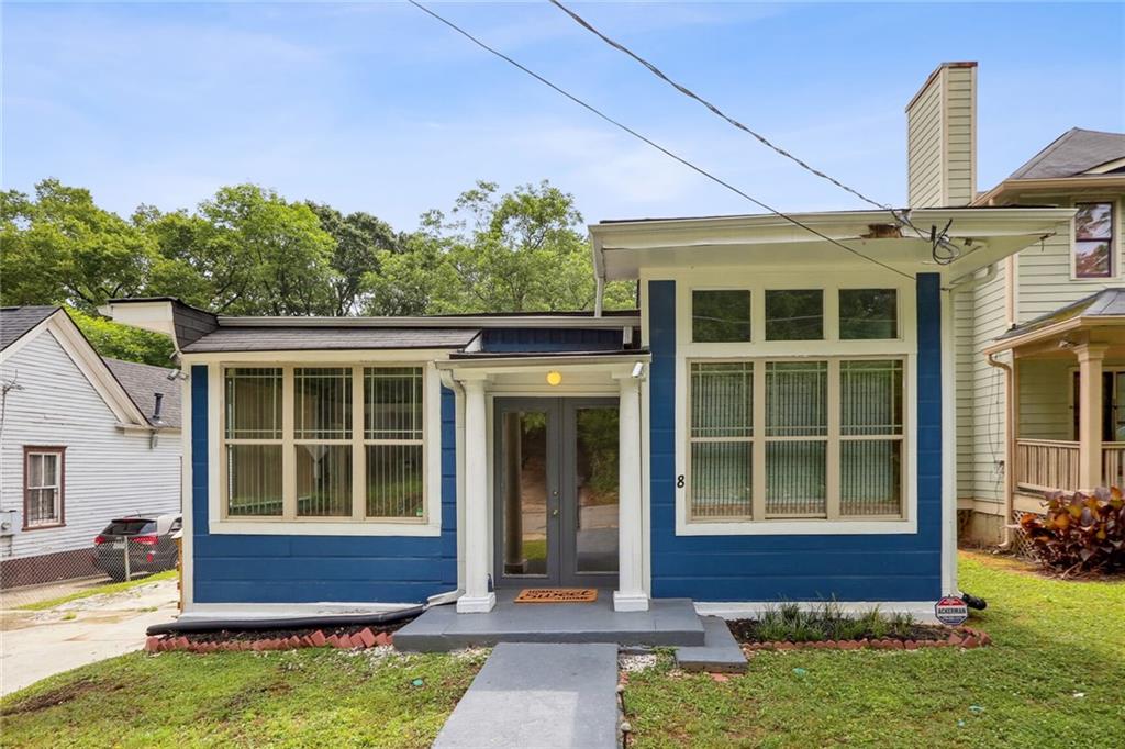 This stunningly renovated residence in the sought-after Atlanta Westside is eagerly awaiting its new homeowner! Boasting an open floor plan, this home greets you with a luminous and airy foyer/sitting area or office space featuring high ceilings and transoms that invite natural light to flood in. Additional living space, a formal dining room, and a kitchen equipped with stainless steel appliances further enhance the abundance of space. In the rear of the home, the master bedroom flaunts a spacious closet and an ensuite bathroom, while the two secondary bedrooms are also generously proportioned. Unwind on your back deck and savor the tranquility. Just minutes away from Westside Beltline, Westside Reservoir Park, GA Aquarium, State Farm Arena, GA Tech, and more!