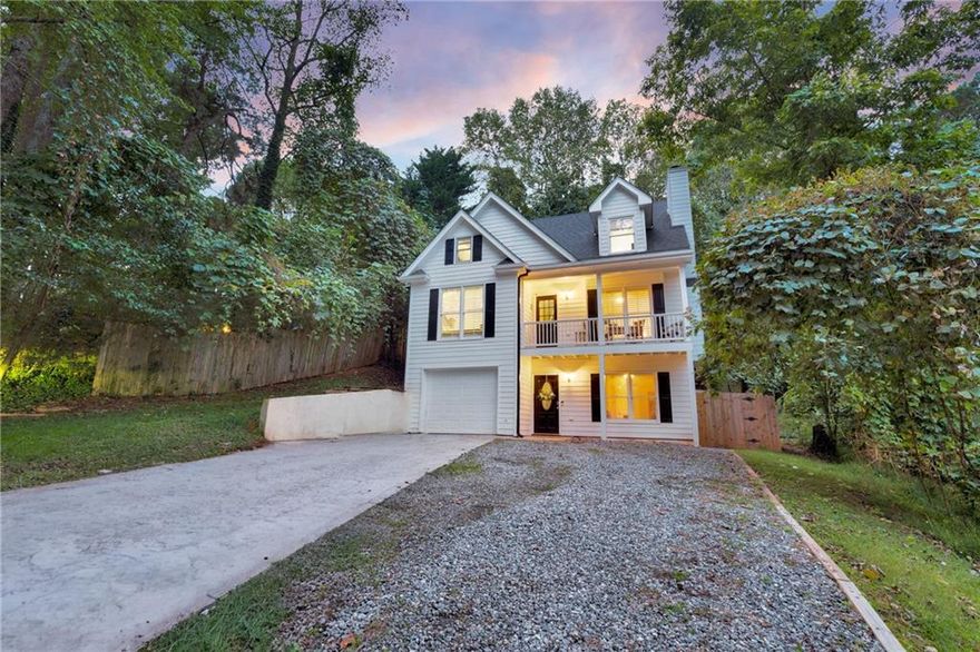 Welcome to 1330 Timber Lake Drive in Cumming, Georgia. This beautiful three-story home offers a flexible floor plan, plenty of natural light, and a fantastic location close to Lake Lanier, downtown Cumming, and award-winning Forsyth County schools.

You’ll enter from the lower level, where you’ll find a spacious media room or flex space that’s perfect for a home theater, gym, or playroom. This level also includes a dedicated workshop/storage area, laundry room, and a one-car garage with plenty of extra storage space.

Head upstairs to the main living area where you’ll find an open layout that’s ideal for entertaining. The kitchen overlooks both the dining area and the living room, creating a seamless flow throughout the space. Just off the main living area, you’ll find access to a private back deck and a fully fenced backyard, perfect for outdoor gatherings. With no HOA, the possibilities are endless! The primary suite is conveniently located on this level and features a walk-in closet, double vanities, a soaking tub, and a separate shower. A half bath is also located on this floor for guests.

On the top level, you’ll find two large bedrooms that share a Jack-and-Jill bathroom. Each bedroom includes a walk-in closet, providing plenty of storage.

From its welcoming front porch to its flexible interior layout, this home is designed for both comfort and convenience. Enjoy being just minutes from Lake Lanier’s marinas and recreation, top-rated Forsyth County schools, downtown Cumming’s restaurants and shops, and easy access to GA 400 for a quick commute to Alpharetta or Atlanta.