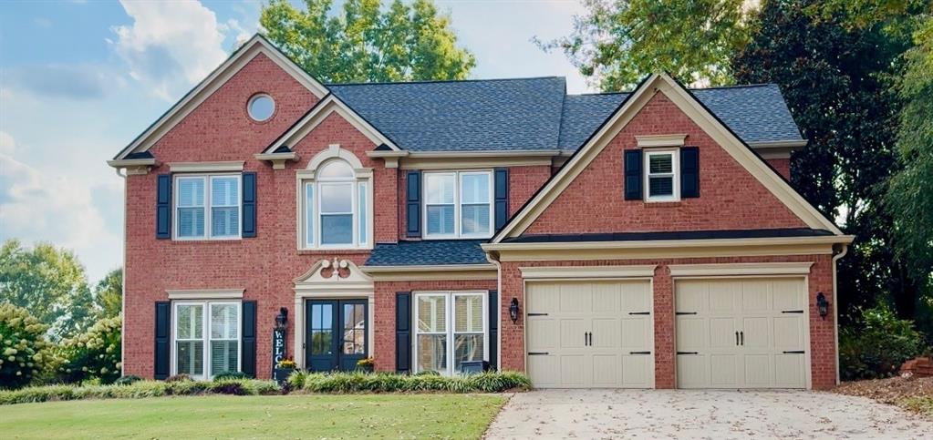 Welcome to your move-in ready home in one of South Forsyth’s most sought-after communities! Lovingly owned by the same family for 23 years, this beautifully remodeled 4 bedroom, 2.5 bath home blends timeless charm with modern updates. This lovely Home features plantaton shutters throughout,new roof, windows, fresh interior & exterior paint,quartz countertops with designer backsplash and lighting. New striking double front doors open to a welcoming two-story foyer with gleaming hardwood floors that flow throughout the main level—including dining room, family room, kitchen, powder room and A versatile flex room just off the dining area that can serve as a breakfast nook or office. The heart of the home is a beautifully updated kitchen featuring brand-new quartz countertops,new oversized kithchen sink and stylish backsplash. This space opens seamlessly into a spacious, two-story family room, making it ideal for both entertaining and everyday living. New hardware on all interior/exterior doors and in the bathrooms add a touch of modern luxury. Upstairs, hardwood floors continue into the hallway and owner’s suite, which features a trey ceiling and plenty of natural light.Three additional bedrooms with new carpet provide flexibility for family, guests, or playroom. Step outside to a stunning landscaped backyard filled with colorful annuals, perennials & shrubs plus oversized patio—an entertainer’s dream! The location is unbeatable! Zoned for top-rated Lambert High School ,This community offers a spacious clubhouse for private parties and neighborhood celebrations, all with a low HOA.Minutes from Avalon, The Collection, endless restaurants, shopping, and the soon-to-open entertainment destination The Gathering. Convenient access to GA-400 makes commuting easy.
