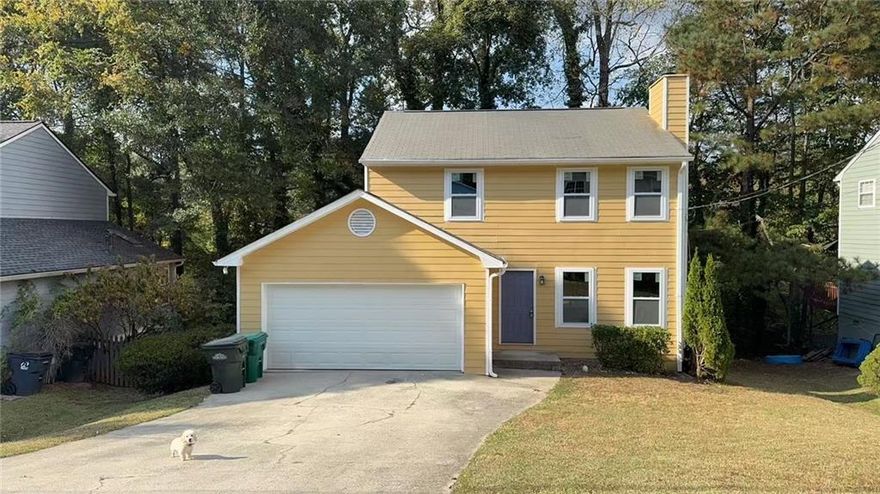 Move -in Ready! Newly renovated &upgraded charming 3 beds 2.5 bath home in a prime location in norcross .,Fresh interior & exterior paint,Upgrated kitchen with New cabinets and countertop .new vinyl flooring ,new dishwasher & range hood.Ideally located just minutes from I-85, shopping, markets, and a variety of excellent restaurants, this property offers both convenience and upside.  The main level boasts a spacious family room with a cozy fireplace, a formal dining area for gatherings, and an eat-in kitchen. Step outside to the cantilever deck overlooking a serene, wooded backyard with a stream — a peaceful, mountain-like retreat right at home.  Upstairs, the primary suite features vaulted ceilings, a large vanity, and a separate garden tub and shower. Two additional bedrooms and a well-appointed guest bath complete the upper level.A great opportunity to own a large, move-in-ready home in an established community without HOA restrictions.Perfect for first -time  homebuyers or investment property.Don't miss this opportunity!
