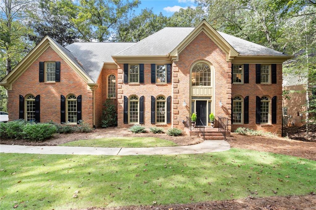Stately 5-Bedroom Brick Traditional on Private Cul-de-Sac Lot in highly desireable Northcliff!
Beautifully updated and move-in ready, this classic brick home offers 5 spacious bedrooms and 4 full baths. Enjoy refinished hardwood floors and fresh interior and exterior paint throughout. The inviting main level features a formal dining room, private home office with French doors, and an open-concept kitchen with a large island, stainless steel appliances, eat-in breakfast area, and walk-in pantry. The family room centers around a cozy fireplace and opens to an oversized back deck overlooking an expansive, fenced, wooded backyard—perfect for entertaining or relaxing in privacy.
Upstairs, the oversized primary suite includes a sitting room, double vanities, soaking tub, separate shower, and generous walk-in closet. Secondary bedrooms are large and include a convenient Jack-and-Jill bath. The finished terrace level offers a second fireplace, additional bedroom and full bath, and access to a covered patio. Other highlights include a side-entry garage, back stairs, and a peaceful cul-de-sac location.
