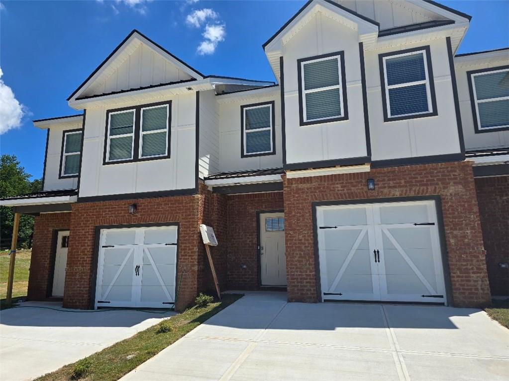NEW START COMMUNITY! NOW IS THE TIME TO RICHLY BUILD EQUITY$$...THIS IS the JADE II plan. a 4 BEDROOM END UNIT. Welcome to this NEW! LUXURY TOWNHOME POOL COMMUNITY! ASK ABOUT 4.99% >30 YR FIXED RATES! ..Buyers Incentives $15,000! & MOVE IN FULL APLIANCES PKG Limited Time Only. This Highly sought after Pool Community, The Grove at Mundy Mill located in beautiful Gainesville, Georgia, is Minutes away from LAKE LANIER, Downtown Gainesville, Major HWY, Major shopping venues, like Sams Club, Walmart, lots of restaurants, and five minutes away from The UNIVERSITY of NORTH GEORGIA. Also, community is located in a Good School district! THE JADE II floor plan enables you to experience that elevated lifestyle. It shows off 4 Bedrooms with the Owner Suite having a sitting room area, SMART FAN in ceiling. The Owners Suite Bathroom gives off that HIGH END experience, which shows off SOFT CLOSE CABINETS, SMART TOILET, LED MIRRORS with WIFI, VESSEL BASIN SINKS, STAND ALONE TUB, and much More! All Secondary Bathroom have premium Granite countertops and RAIN HEAD SHOWER, The main level is Open and Spacious. The Kitchen area which faces the family room is spacious and has a large granite Island with Cup Washer, pull down faucet, and Pendant Lights and tons of cabinet space. The Family room is so inviting with a decorative recessed Fireplace, Smart Fan. All Townhomes have FULL BLINDS throughout home and are Smart Homes having Smart Home Panel, Smart Thermostat, and a UV HVAC system which is an advance air purification solution designed to improve indoor air quality. Also, to mention ALL Garages are Pre-Wired for EV CHARGING STATIONS for those homeowners that own Electric Cars! .. For More Information call Errol Gunnz ...( Completion of this Townhome is estimated End of AUGUST ) Photos are a representation only.- Lot 174