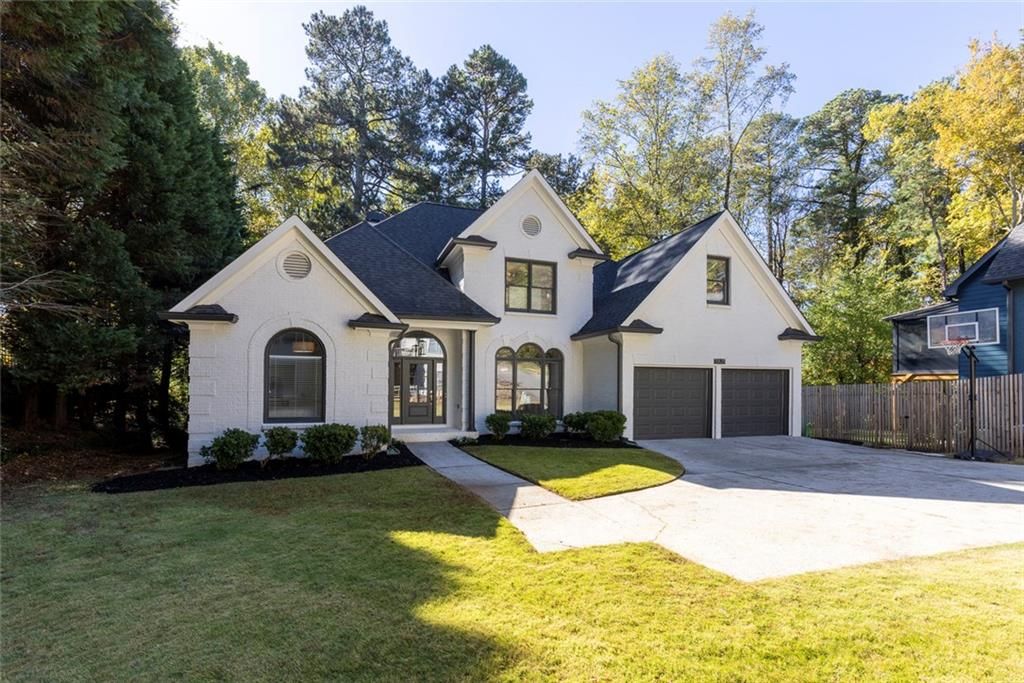 Photo of 5825 Mitchell Road NW, Atlanta, GA 30328 (MLS # 7704485)