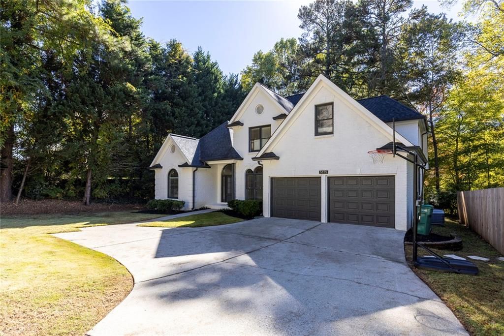 Photo of 5825 Mitchell Road NW, Atlanta, GA 30328 (MLS # 7704485)