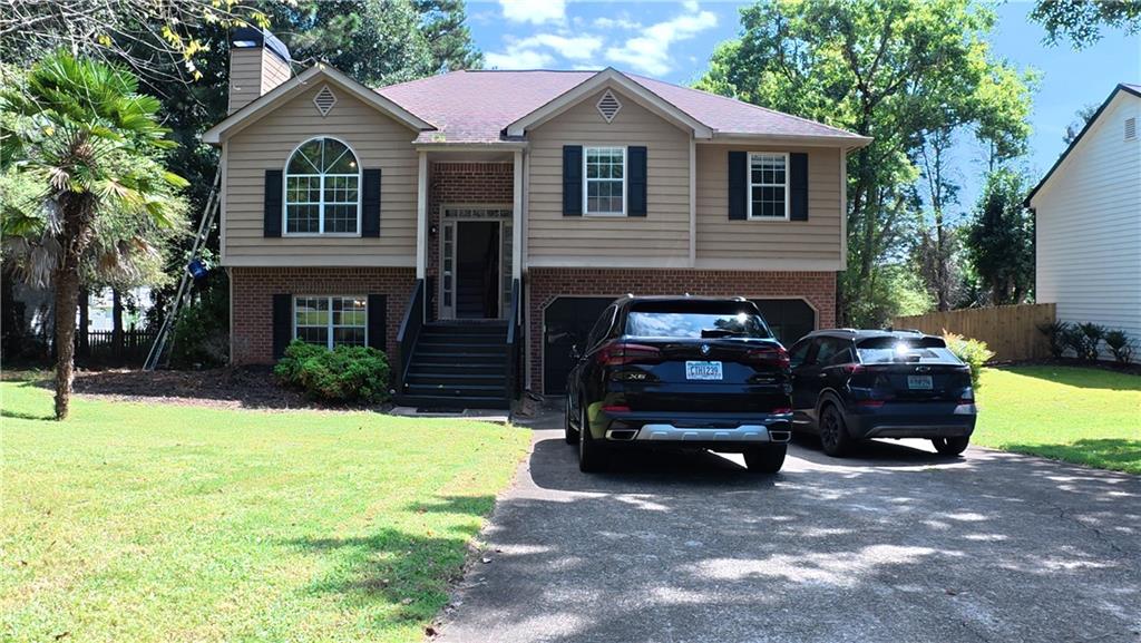 Quiet Community, 4 bedroom and 3 full baths, Deck looking back large backyard, No carpet in the house, Kitchen with sunny breakfast area features Quartz countertops, Wood cabinets, Refrigerator, Laundry room with Washer and Dryer, Master with Garden Tub & separate Shower. Large Family room with FirePlace, Separate Dining room, 2 Car garage with garage door opener. Private fenced Backyard.