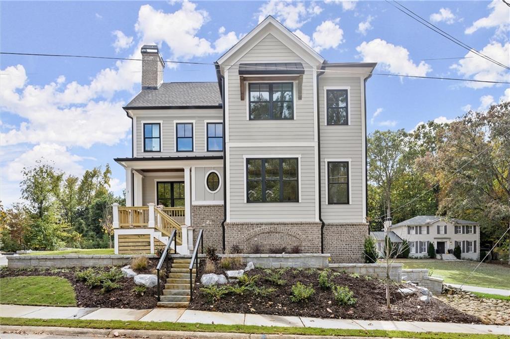 The moment you step foot in this home you'll be amazed of the panoramic views of trees. This corner lot gets so much natural light and every view is of trees instead of looking inside the next door neighbor's dining room. Welcome to Wynn Walk, a New Boutique Community of Four Energy Efficient Luxury Homes in Brookhaven nestled off of Wyndale Rd, a cul-de-sac street. This exclusive neighborhood is in a prime location with easy access to Perimeter, Town Brookhaven and downtown Chamblee. Close to several parks, Award Winning Schools and fine dining. Another custom built home from Copperleaf Partners, LLC features 4 Bedrooms, 4,5 Bathrooms, Beautiful Kitchen with Ceiling Height Cabinets, Upscale GE Monogram Appliances with 6-Gold Burner Gas Range Top, Commercial Built-in Stainless Hood with Warmer, Double Ovens, Quartz Counters, Oversized Island, and Walk-In Pantry with Custom Built-In Shelving. Lovely 6.5" Wide Plank Hardwoods and Wood Ceiling Beams. The Panoramic Views from All the Windows Feature Trees and Lots of Natural Light(you don't have to look into the neighbor's window). You'll love the owner's suite with Trey Ceiling, Pretty Outside Views, Custom Shower with a Rain Shower Head and Hand Held Sprayer, Soaking Tub and Custom Stained Cabinets. Spacious Laundry Room with Cabinets and Undermount Stainless Sink. Modern Iron Railings, and Covered Porch. Lots of storage in this home due to poured concrete basement ready to be finished. Great for storage or a child's play space. Mudroom off the garage with Decorative Brick Pavers and Built-in Bench. High Efficiency Gas Furnace and 2 50 Gallon Electric Water Heater. Landscaping Irrigation System.