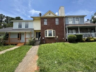 Available Now! Spacious two-story townhome with 3 bedrooms and 2.5 baths, just minutes from Atlanta. Enjoy a bright living room with a fireplace, an open kitchen featuring an island and breakfast bar, and spacious upstairs bedrooms, including a primary suite with a private bath, complete with ceiling fans for year-round comfort. The large backyard is perfect for pets, play, or entertaining. Conveniently located near parks and city access. Your pets are welcome, and the monthly rent is $1,470. Utilities not included.**AVOID RENTAL SCAMS: Rental fraud happens every day; protect yourself! Never wire cash or send gift cards for payments or deposits.