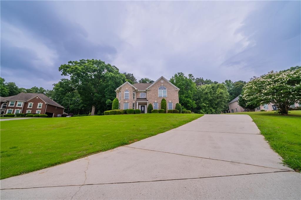 Beautifully refreshed 4-bedroom, 2.5-bath home featuring full interior paint, new LVP flooring, and updated doorknobs throughout. The kitchen boasts painted cabinets, quartz counters, and a new sink—move-in ready with modern updates and plenty of space for comfortable living!