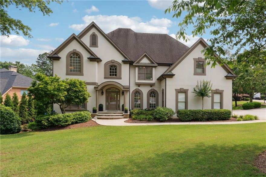 Step into a world of refined elegance at this luxury residence in the coveted Falls of Autry Mill swim-tennis enclave of Johns Creek. Set in a quiet cul-de-sac on a serene corner lot with a circular driveway, this home promises both endless entertaining opportunities and exceptional privacy. The heart of the home is a fully remodeled chef’s kitchen, featuring a commanding 9½-foot island, custom cabinetry, and top-tier Wolf dual-fuel range (six burners, double ovens, griddle). The vaulted, two-story great room showcases a dramatic marble fireplace, and panoramic windows flood the space with natural light.  The spacious master suite offers a fireside sitting room, high ceilings, and dual walk-in closets.

An expansive deck overlooks a resort-style backyard oasis complete with a saltwater pool, a heated four-season spa, and lush, professionally designed landscaping.  The fully renovated terrace level includes a sophisticated home theater with stadium seating and pre-wired surround sound; an entertainer’s kitchen with two under-counter refrigerators; and direct access to a large patio for seamless indoor-outdoor flow.  A dedicated home gym and yoga studio (with gym flooring and a full wall mirror) offer serene pool vistas, which are perfect for wellness pursuits at any hour. 

Two private offices provide easy work-from-home settings, and a convenient second-floor laundry is adjacent to the generously sized secondary bedroom suites. Membership-style neighborhood amenities include 10 lighted tennis courts, 2 pickleball courts, 2 community pools, a splash pad, a children’s playground, and a fully equipped clubhouse fitness center—all just steps from your door.

Imagine your most sophisticated gatherings, tranquil retreats, and active-lifestyle days unfolding against this backdrop of luxury and leisure. This is more than a home—it’s a lifestyle destination. Your invitation awaits at 100 Pine Mist Circle!

Ideally located in a quiet corner of the neighborhood and with easy access to 10 tennis courts, 2 pickleball courts, 2 community pools, a playground, and the clubhouse fitness center all within the neighborhood, this home has it all! Imagine life at 100 Pine Mist Circle, a true dream come true in the #1 city to live based on US News World Report's latest ranking of US cities that came out in May 2025!