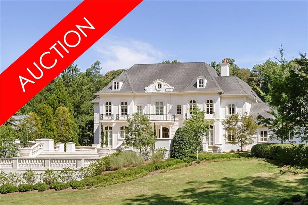LUXURY ABSOLUTE AUCTION – SELLING WITH NO RESERVE – MAY 19TH. Elegance and modern amenities are united in this European inspired William T. Baker designed home, that was showcased in New Classicists: American Architecture, as the 2015 Atlanta Symphony Decorator Show House and Gardens. Enjoy a full 2 acres with pool, manicured gardens and terraces, a 26-foot grand foyer domed ceiling, climate-controlled wine cellar, and whole house programmable system including security. This Exceptional property can be yours now. A RARE opportunity for you to own at YOUR price!
