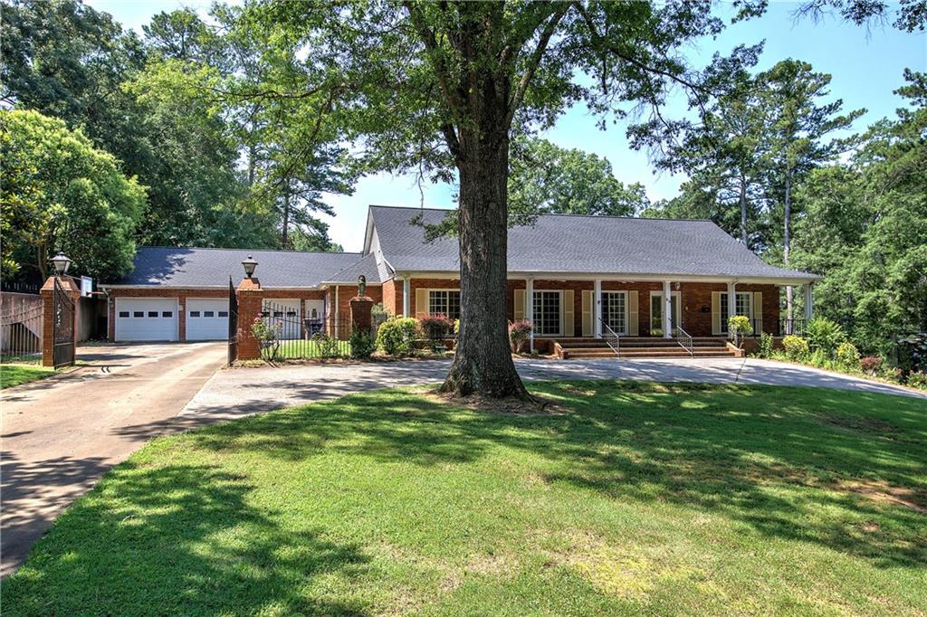 Spacious 7-Bedroom Ranch on 1.1 Acres in Prime Cartersville Location!
Welcome to this expansive 5,460 sq ft home nestled on a beautiful 1.1-acre corner lot in one of Cartersville’s most sought-after areas—just minutes from charming downtown shops, dining, and top-rated schools.
This thoughtfully designed ranch offers a total of 7 bedrooms and 4.5 bathrooms, providing incredible flexibility for multi-generational living, guests, or a home office setup. The main level features 4 bedrooms and 2.5 bathrooms, an open and inviting layout, and a bonus room upstairs complete with its own bedroom and full bath—perfect for a private guest suite or teen retreat.
The fully finished basement is a home of its own, boasting 2 additional bedrooms, a full bath, a second kitchen, and a cozy family room with a fireplace—ideal for in-laws, rental income, or entertaining.
Enjoy the serenity of your large corner lot, offering plenty of space for outdoor activities. Homes with this much space in such a desirable location don’t come around often—schedule your private showing today!