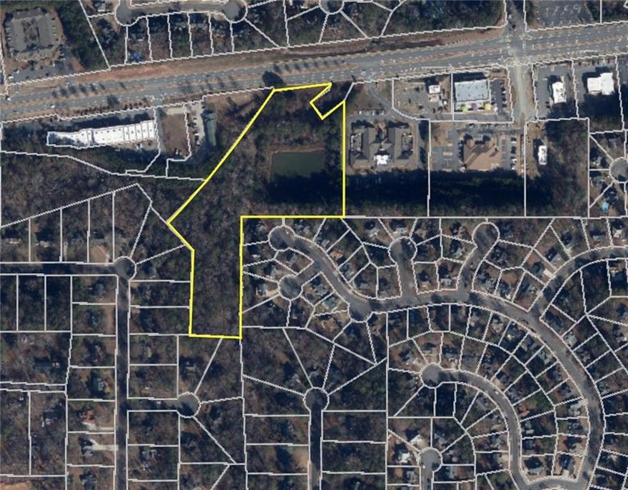 Rare opportunity to buy 7.844 acres on Eagle Drive at a bargain price.  All utilities available including sewer.  Vibrant commercial corridor near Etowah High School.  Excellent location with all utilities available.  Mixed zoning across the site with GC zoning at the road frontage, NC and R10 at the back of the property.  This is one of the last remaining commercial development sites remaining in the Eagle Drive corridor.