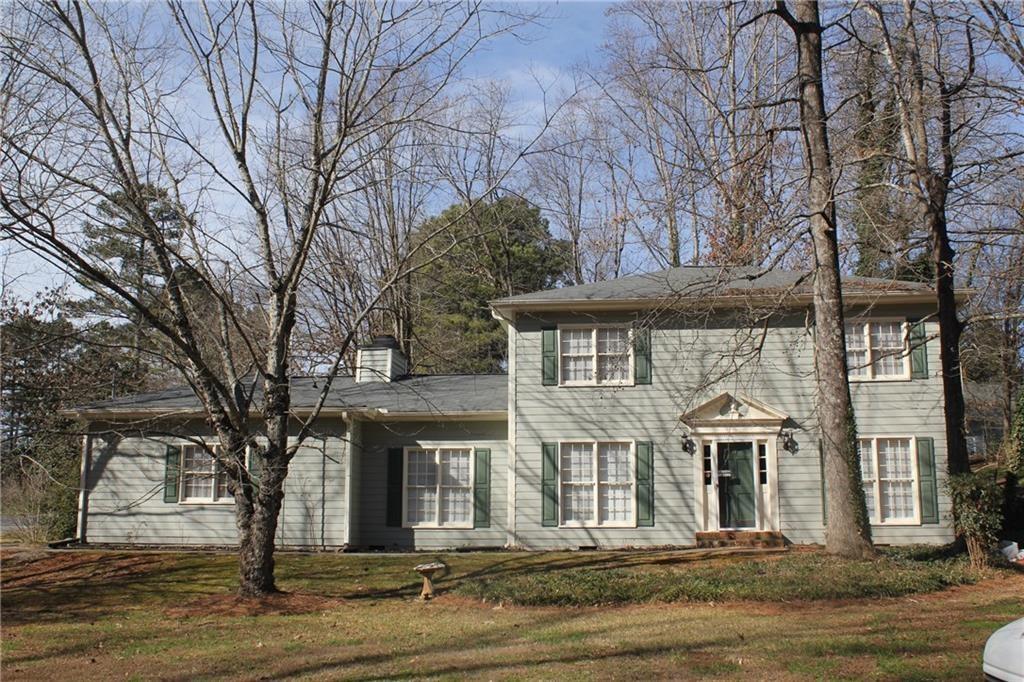 Spacious 4BR/3BA home on over a ½-acre corner lot in award-winning Brookwood School District. Interior features include updated ceramic tile in all bathrooms with frameless glass showers, and a fully updated kitchen with modern cabinetry, solid-surface countertops, and stainless steel appliances. Freshly painted throughout. Conveniently located near shopping and dining. Move-in ready! Owner is a licensed real estate agent in the state of Georgia.
