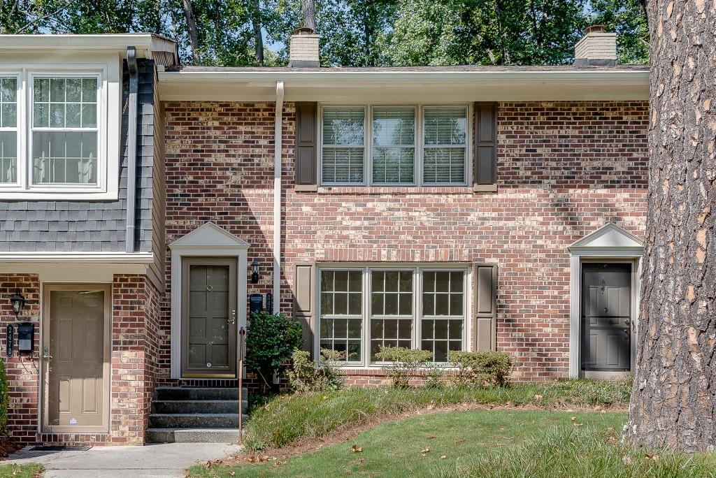 Tucked away in a serene lakeside community, this immaculate 2-bedroom, 2.5-bath townhome offers the perfect blend of tranquility, comfort, and convenience. Set at the back of the neighborhood in a peaceful, park-like setting, it's an ideal retreat. As you step inside, you'll find a freshly painted, bright and welcoming interior. The spacious living room features wood floors and a wood-burning fireplace. The eat-in kitchen, with solid surface countertops, flows to a formal dining room with French doors hat open to a deck and private backyard surrounded by lush greenery. Upstairs, the generous primary suite offers a walk-in closet and a renovated, spa-inspired bath. The second bedroom also features a large closet and an updated ensuite bath perfect for guests or a home office. Community amenities include scenic walking trails through mature landscaping, leading to private lake access and boat storage for your canoe or kayak. HOA dues cover exterior maintenance and landscaping, ensuring easy, low-maintenance living in a friendly, owner-occupied neighborhood. Located within the Lakeside High School district, this home is just a short walk to the newly revitalized Northlake Mall and Emory Administrative Complex. You'll also enjoy close proximity to Emory, CDC, Mercer, Oglethorpe, VA, I-285, I-85, and the proposed Tucker-Northlake Trail a new multi-use path connecting downtown Tucker to the Northlake area. With its peaceful surroundings, updated interiors, and unbeatable location, this townhome is more than just a great value it's a wonderful place to call home.