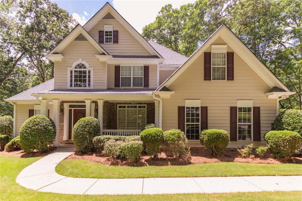Welcome to 5581 Fox Glove Ct, a thoughtfully designed home situated just outside of Douglasville on over 2.5 acres of peaceful, private land. This spacious property offers a flexible layout perfect for multi-generational living or growing families. The partially finished basement includes a private bedroom with an attached full bath—ideal as an in-law or teen suite—plus two additional finished rooms that can serve as a home office, gym, or media space. There’s also ample unfinished space for storage or a workshop.
On the main level, you'll find a grand living room with a cozy fireplace, a large eat-in kitchen with solid surface countertops and abundant cabinet space, and a separate dining room perfect for entertaining. The main level also features a guest suite with a full bath and a luxurious master suite complete with a spa-like bathroom, jetted tub, oversized walk-in closet, and dual vanities.
Upstairs, three more generously sized bedrooms share a full bath with double vanities and separate entrances from both the hallway and one of the bedrooms, offering privacy and convenience. With its versatile floor plan, peaceful setting, and thoughtful details throughout, this home is a rare find.