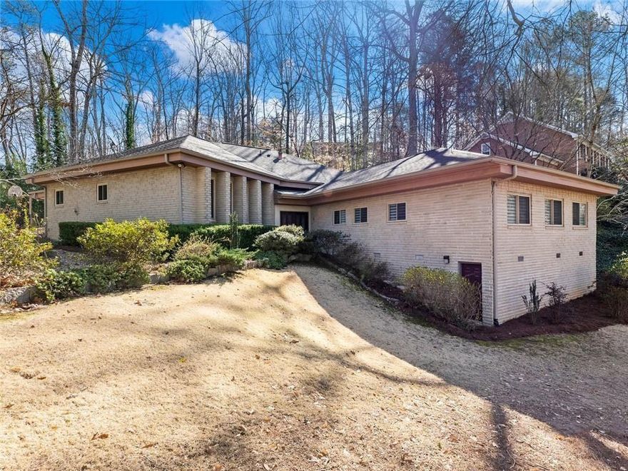 BACK ON THE MARKET WITH BRAND-NEW BATHROOMS!
Discover an exceptional cul-de-Sac retreat in Atlanta's prestigious Oak Grove neighborhood. Discreetly situated on a tranquil cul-de-sac, this custom-built contemporary home offers an unparalleled blend of privacy, luxury, and convenience. Zoned for the highly-rated Oak Grove Elementary School, this stunning 5-bedroom, 3 full and 2 half-bath residence is a rare, turn-key opportunity you won't want to miss.

Step inside and be greeted by an impressive, modern interior defined by soaring high ceilings and beautiful gleaming hardwood floors throughout the main level. The open, spacious floor plan creates an inviting atmosphere, ideal for grand entertaining or quiet evenings at home.

At the heart of this residence lies a true Chef's Dream Kitchen. Meticulously appointed for both function and style, this culinary haven features a premium suite of appliances, including:

Miele wall ovens (with a fully plumbed steam oven)

Integrated Jenn-Air built-in refrigerator

Professional-grade Bluestar 6-burner range with 25,000 BTU open burners

The kitchen is crowned by a breathtaking quartzite waterfall island accented with unique Zebra Wood, custom cabinetry, and abundant prep space. The perfect blend of performance and design.

The main-level Master Suite is a private sanctuary, boasting a just-renovated, spa-like bathroom for ultimate relaxation. The remaining bedrooms and the two additional newly updated bathrooms ensure supreme comfort and privacy for family and guests.

Outside, enjoy your expansive, fenced-in backyard and the serenity of a covered patio, creating a perfect year-round extension of your living space. Additional bespoke features include an attached two-car garage and a connoisseur-ready 440-bottle Vinoteque wine cabinet.

Offering modern luxury, top-tier schools, and a prime, low-traffic location, this exceptional home is a true hidden gem.

Schedule your private showing today and step into your new dream home!