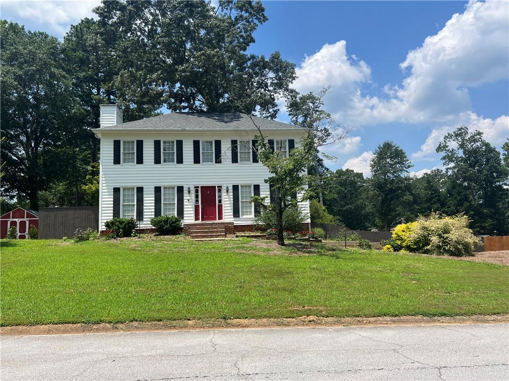 Beautiful Home in the Brookwood District! This Traditional Style home features 3 bedrooms and 2 and a half baths with wood flooring throughout the main level. Spacious kitchen includes stainless steel appliances and breakfast area. Large sitting room and dining room for entertaining. A bright and comfortable sunroom adds additional living space on the main. An extra room in the basement that is great for a play room, home office, or media room. Fenced and Level backyard with is privately situated in a cul-de-sac and loaded with fresh landscaping. Fantastic location and no HOA! Motivated Seller!!!