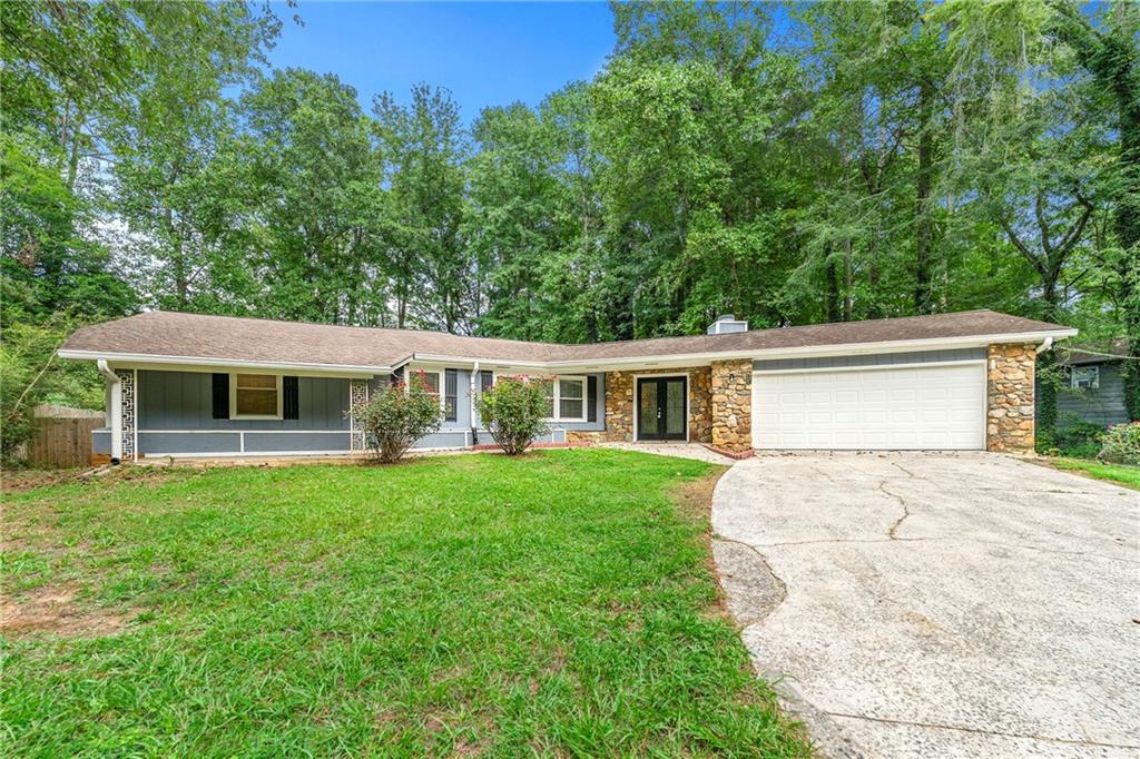 Welcome to 3020 Karen Ln, a beautiful ranch home on a finished basement located in Marietta, GA. This charming residence offers: • Approximately 3,015 square feet of living space • 5 bedrooms and 3 bathrooms • Updated kitchen with granite countertops and stainless steel appliances • Cozy fireplace in family room • Finished basement with additional living space and bedrooms • Attached 2-car garage • Private backyard with deck for outdoor relaxation • Convenient access to shopping, dining, and recreation Don't miss this opportunity to make this lovely property your new home! Schedule a showing today to experience the comfort and charm of 3020 Karen Ln.