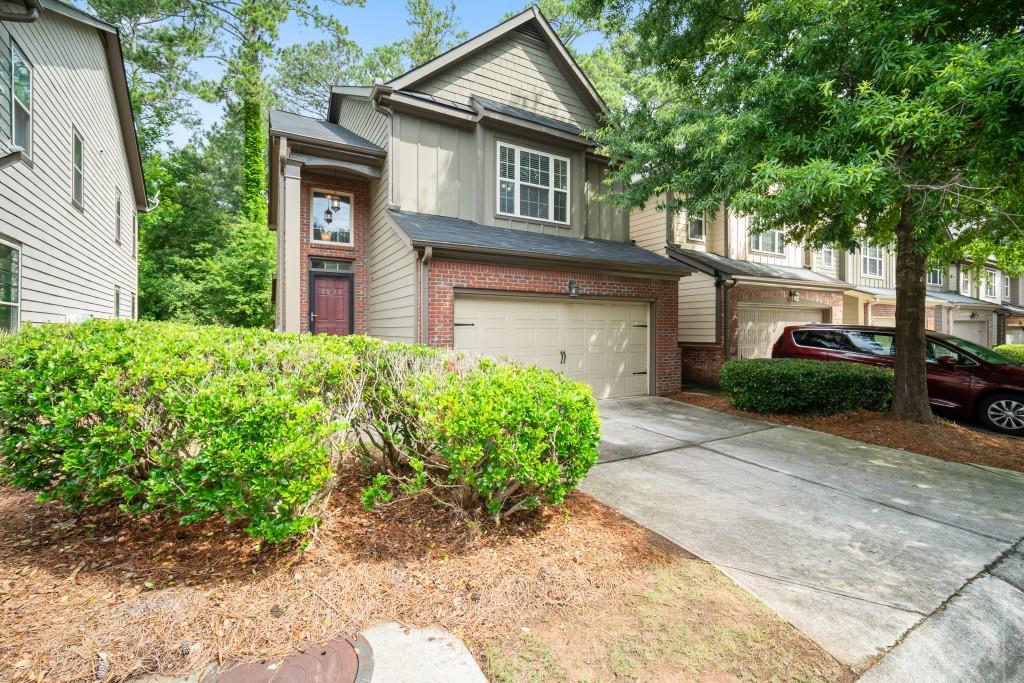 This spacious brick sided end unit is on the market! This home is almost new with all of the features it has had done recently. Almost new home gets even better with it being as close to Kennesaw Mountain National Park, Truist Park, and all of the shops and restaurants of downtown Marietta.
